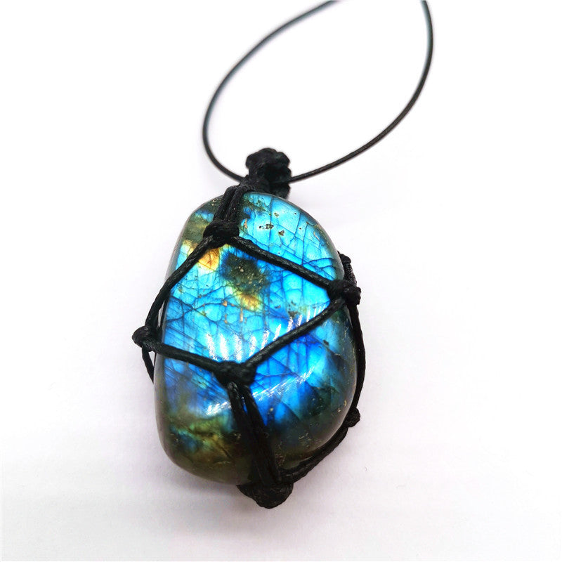 Labradorite crystal pendant detail showing iridescent labradorescence effect