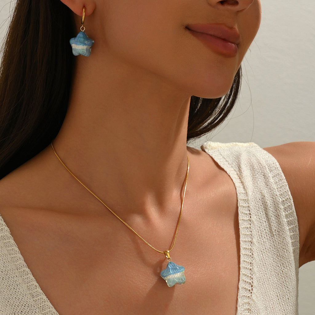 Woman wearing waterproof opal star jewelry set - 18K gold plated necklace