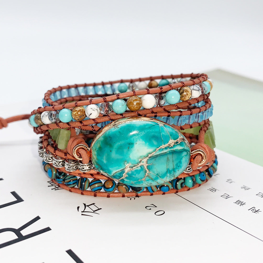 5-layer turquoise wrap bracelet set showing mixed gemstone beads and natural tones
